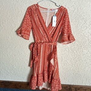 Never worn dress that is cute and very light weight.